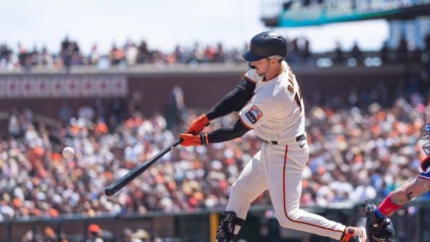 SF Giants catcher Patrick Bailey hits a single during the fourth inning against the Texas Rangers at Oracle Park on August 13, 2023.